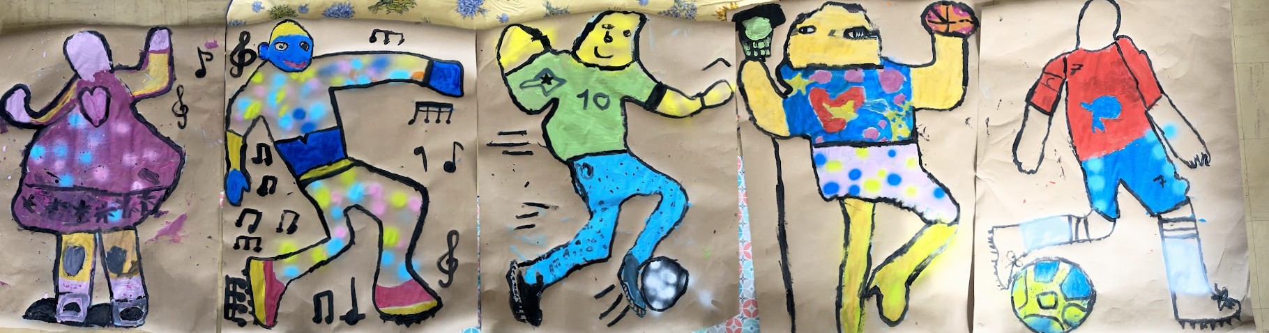 Œuvre collective de street art réalisée par des enfants lors d'un atelier fresque murale
